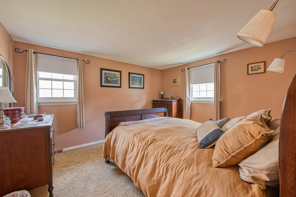 10 Colby Road Bridgewater, MA 02324 - Photo 29 of 42 a bedroom with a bed and a couch