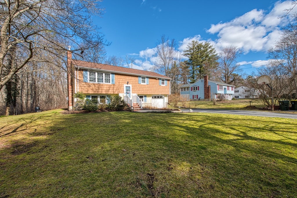 10 Colby Road Bridgewater, MA 02324 - Photo 3 of 42 a front view of a building with garden