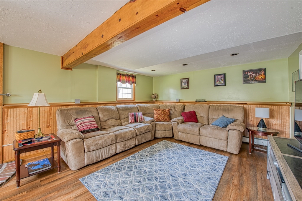 10 Colby Road Bridgewater, MA 02324 - Photo 36 of 42 a living room with furniture and a couch
