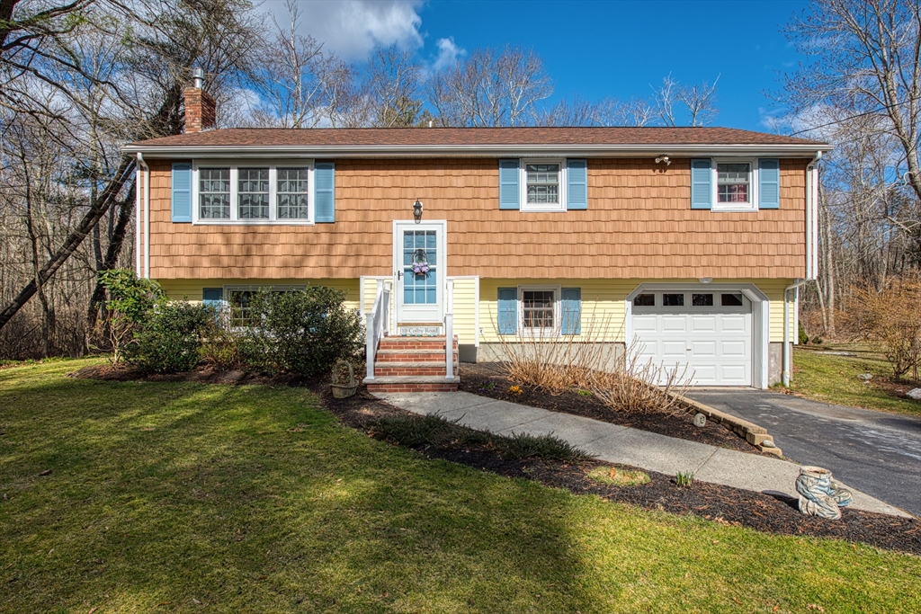10 Colby Road Bridgewater, MA 02324 - Photo 4 of 42 a front view of a house with a yard