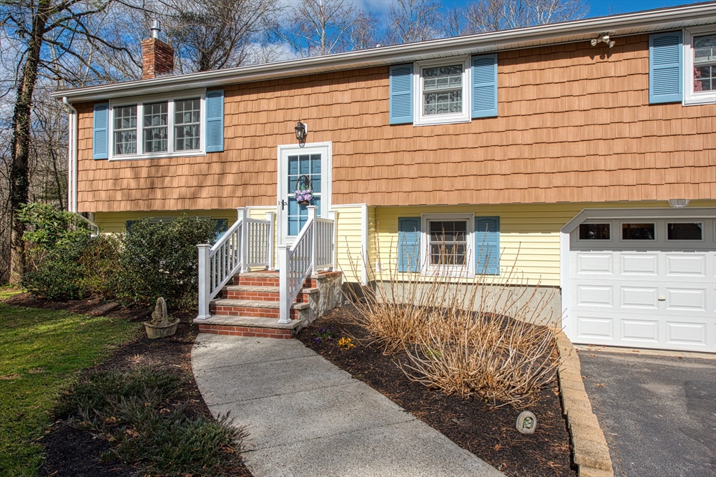 10 Colby Road Bridgewater, MA 02324 - Photo 5 of 42 a front view of a house with a yard