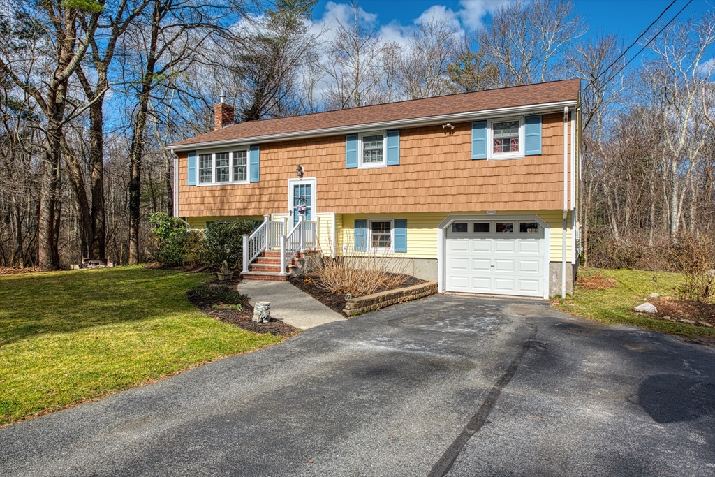 10 Colby Road Bridgewater, MA 02324 - Photo 7 of 42 a front view of a house with garden