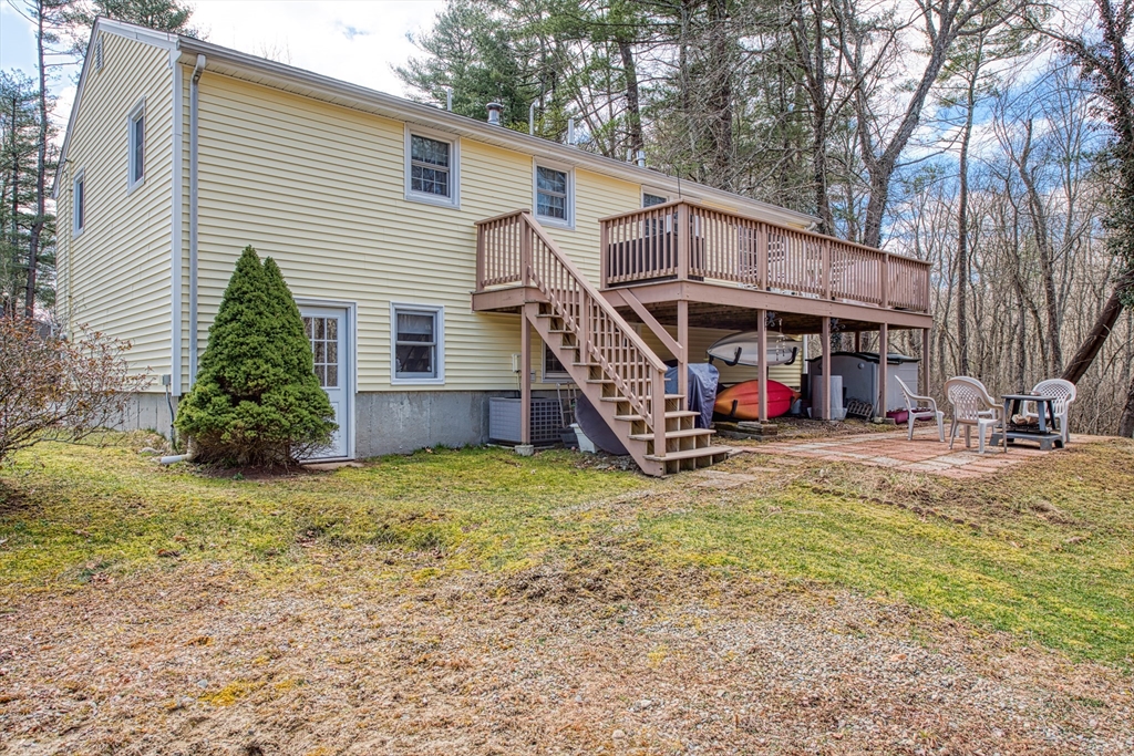 10 Colby Road Bridgewater, MA 02324 - Photo 8 of 42 a view of a house with a yard patio and slide