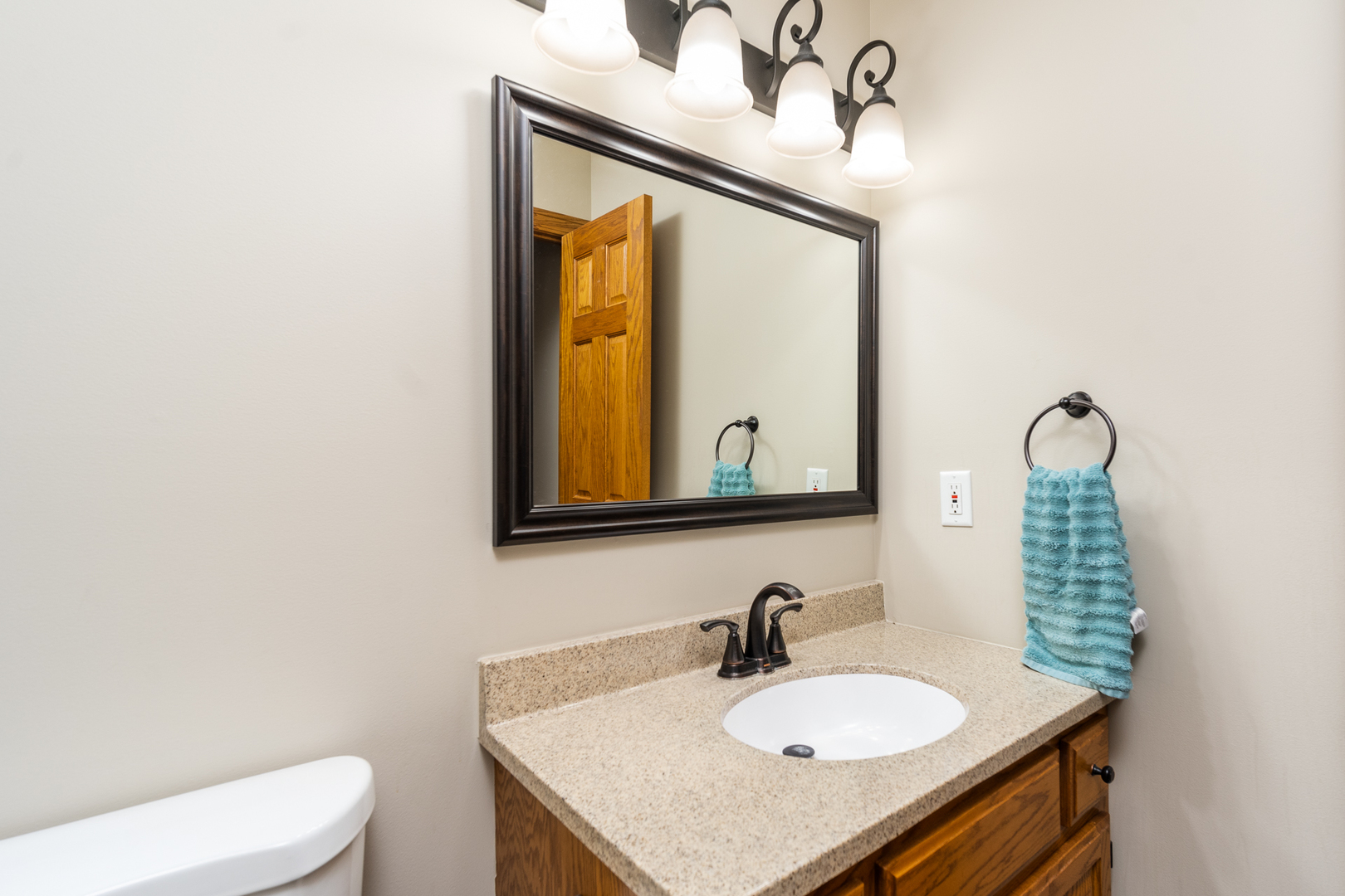 100 Willow Trail Spring Valley, IL 61362 - Photo 22 of 57 a bathroom with a sink vanity mirror and toilet