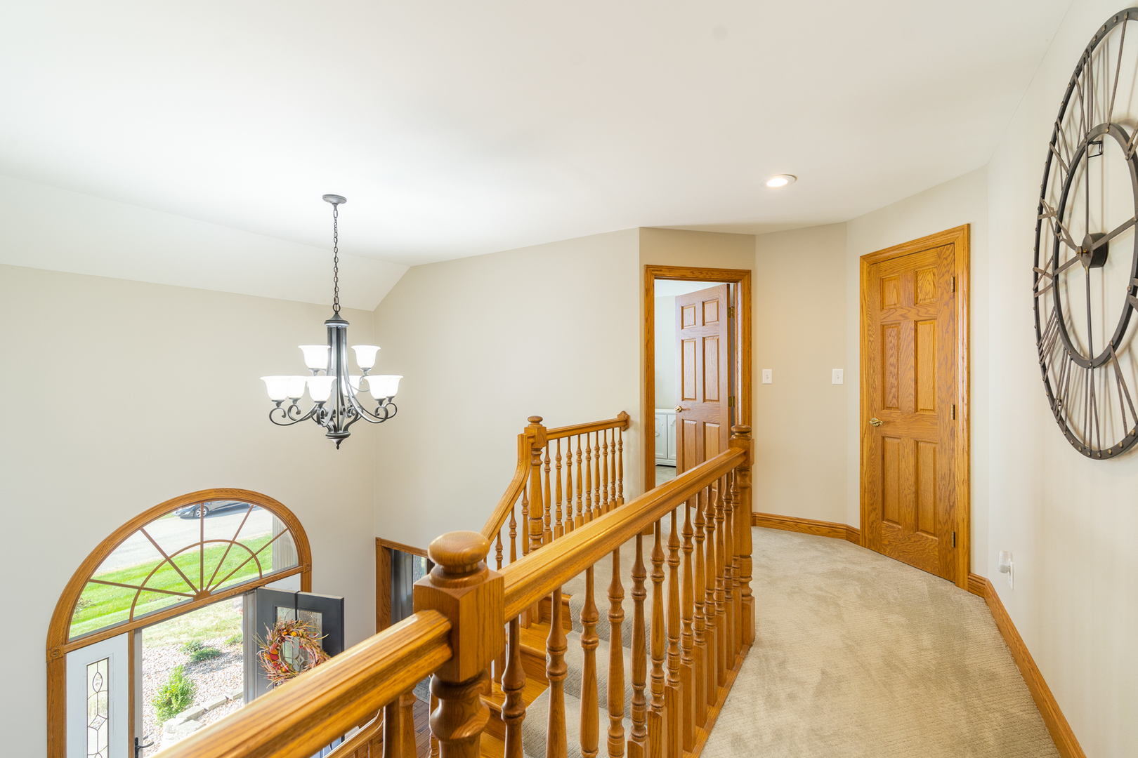 100 Willow Trail Spring Valley, IL 61362 - Photo 23 of 57 a view of a livingroom with furniture wooden floor windows and a chandelier