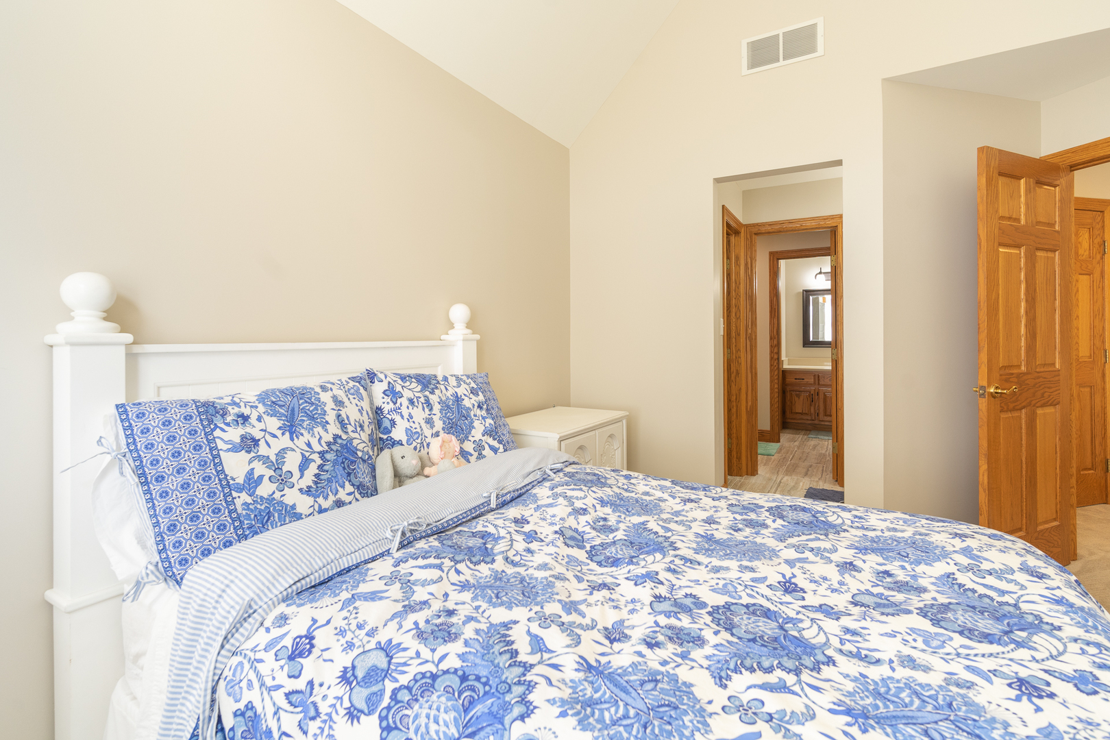 100 Willow Trail Spring Valley, IL 61362 - Photo 25 of 57 a bedroom with a large bed and a wooden floor
