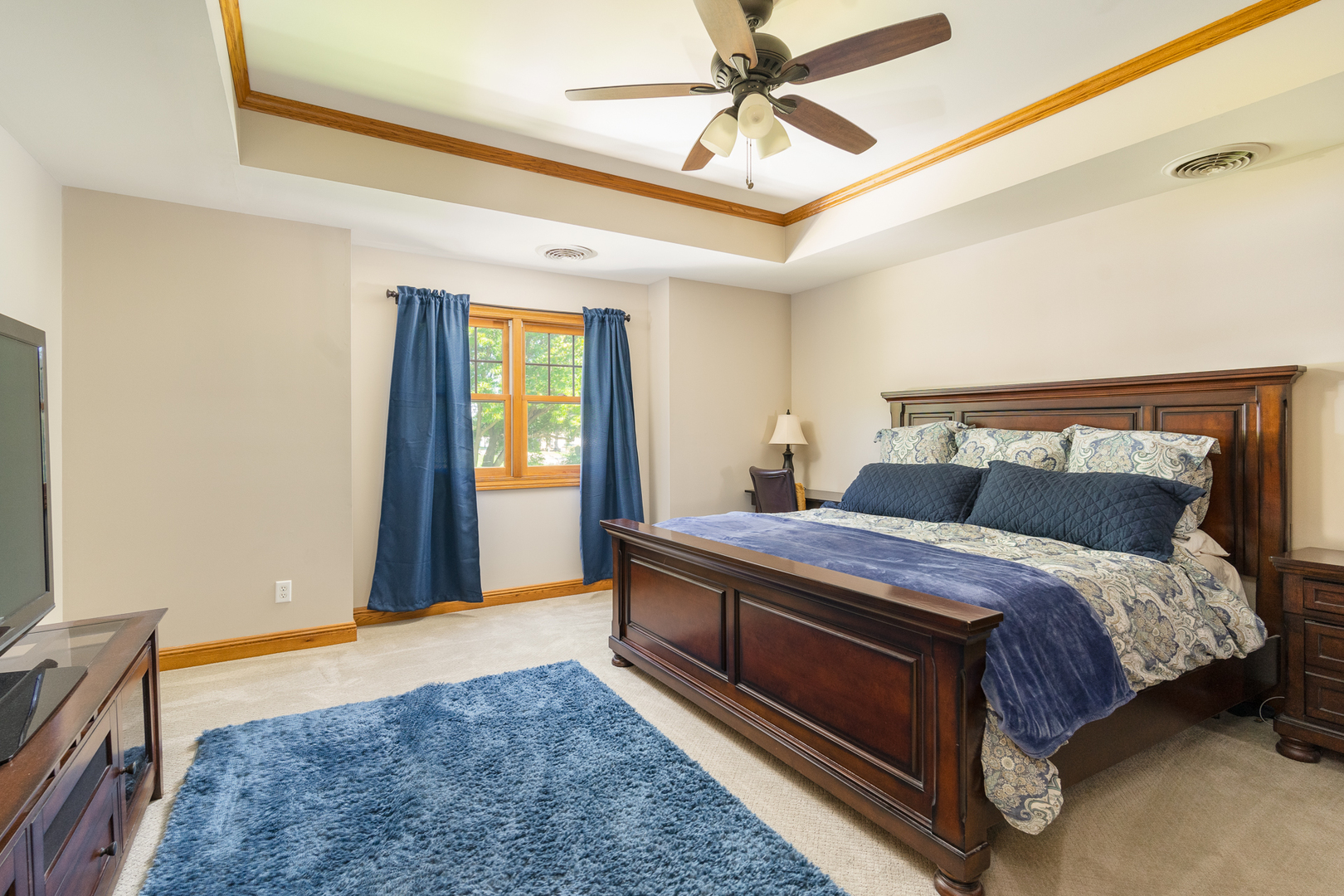 100 Willow Trail Spring Valley, IL 61362 - Photo 31 of 57 a bedroom with a large bed and a chandelier