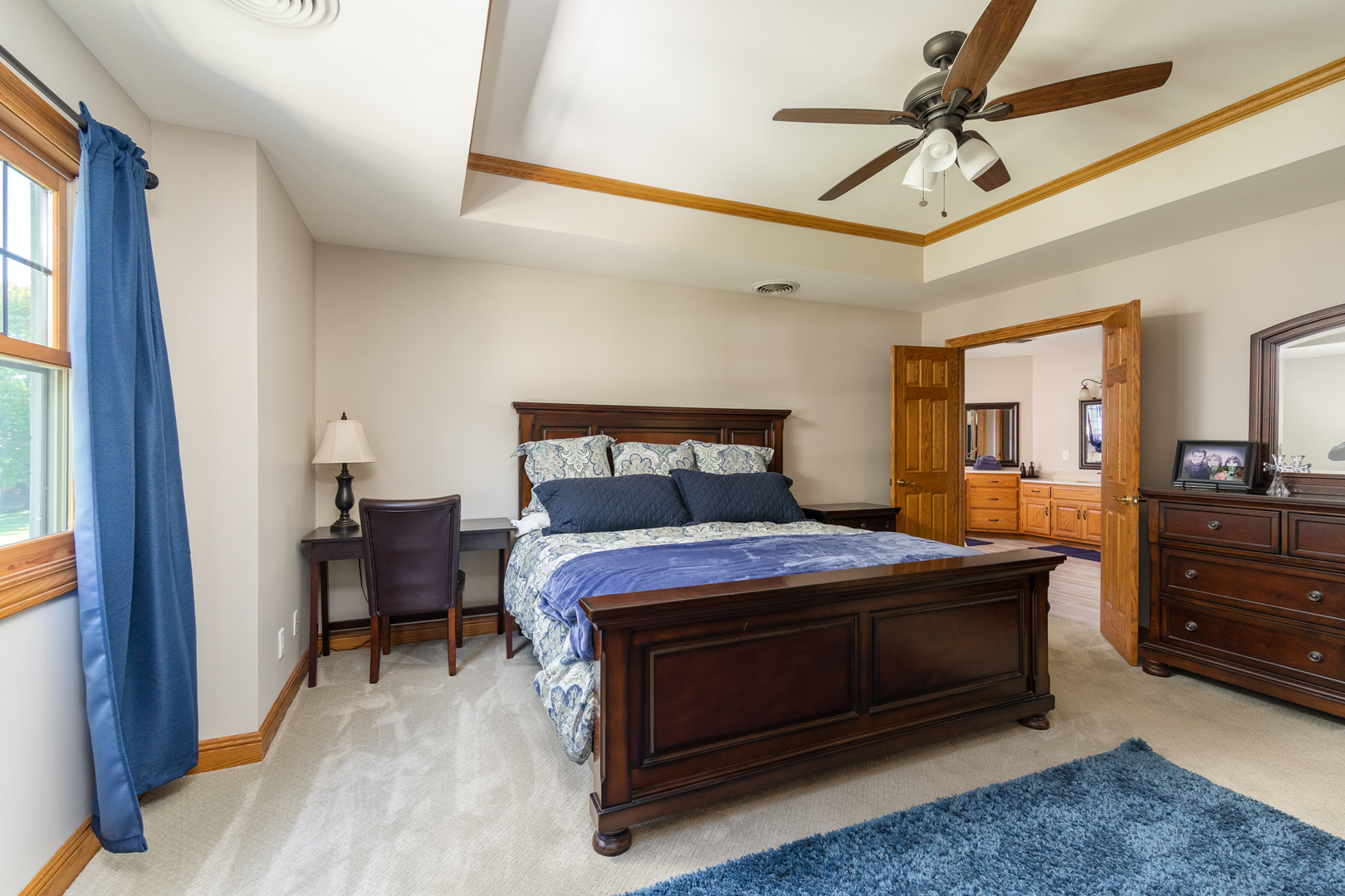 100 Willow Trail Spring Valley, IL 61362 - Photo 32 of 57 a bedroom with a bed and a chandelier