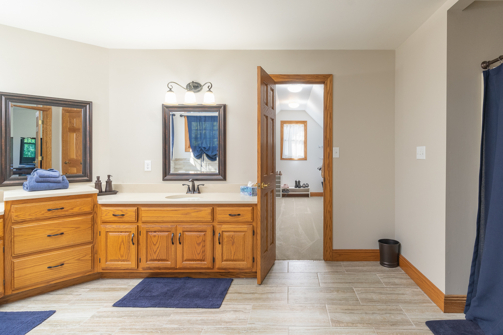 100 Willow Trail Spring Valley, IL 61362 - Photo 33 of 57 a spacious bathroom with a granite countertop sink and a mirror