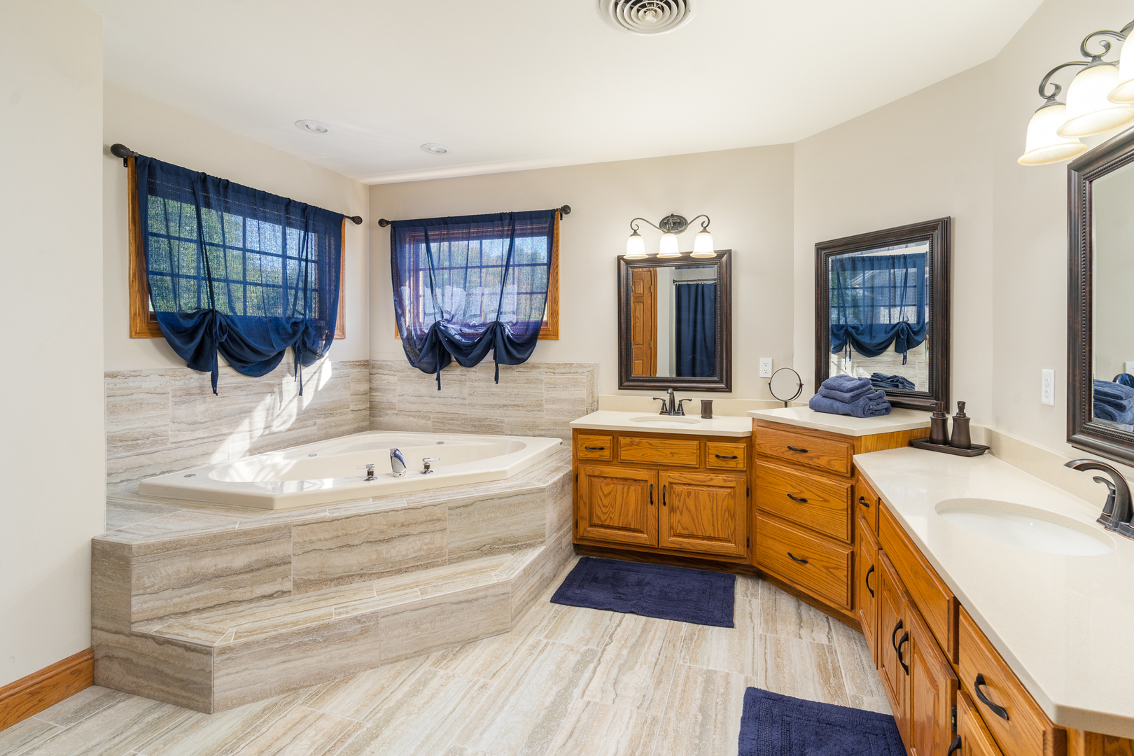 100 Willow Trail Spring Valley, IL 61362 - Photo 34 of 57 a spacious bathroom with a tub double vanity sink and a mirror