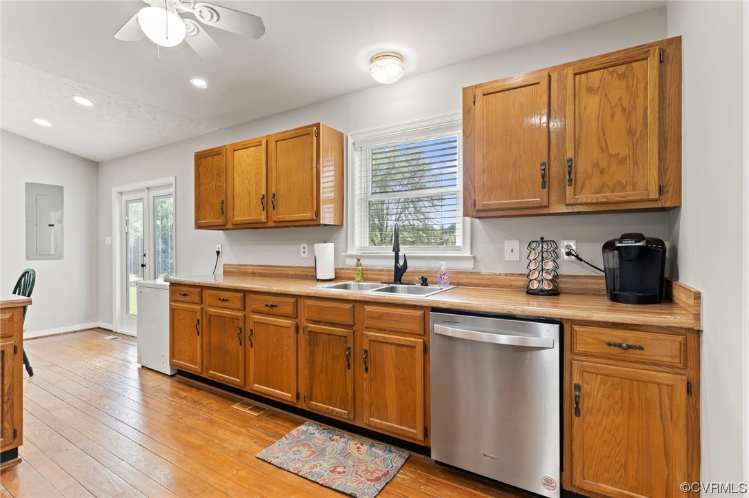 3315 Three Chopt Road Gum Spring, VA 23065 - Photo 11 of 27 a kitchen with stainless steel appliances granite countertop wooden cabinets a sink and dishwasher with wooden floor