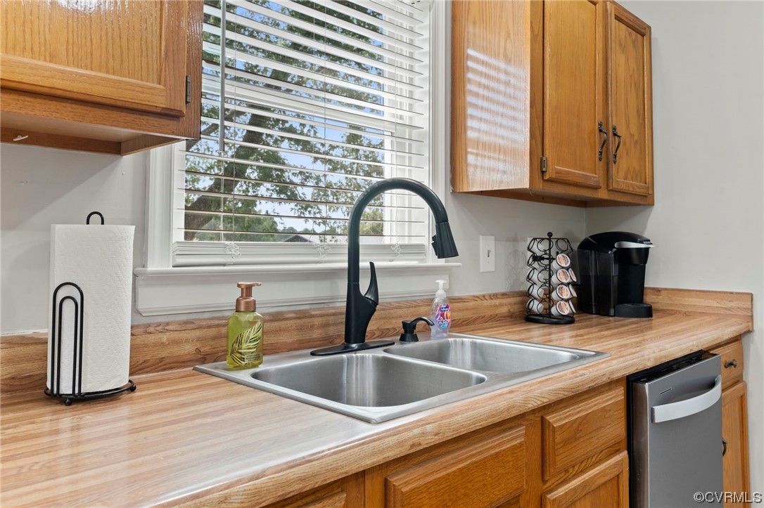 3315 Three Chopt Road Gum Spring, VA 23065 - Photo 13 of 27 a view of a kitchen counter top a sink and dishwasher