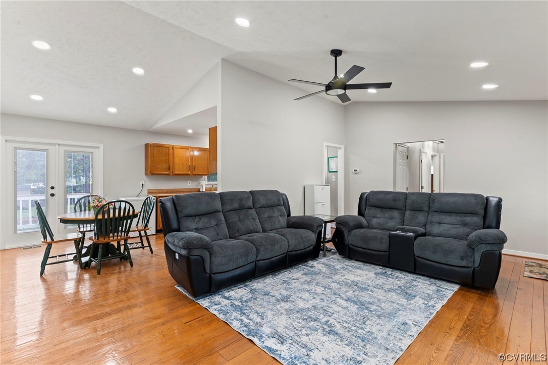 3315 Three Chopt Road Gum Spring, VA 23065 - Photo 7 of 27 a living room with furniture ceiling fan and a rug