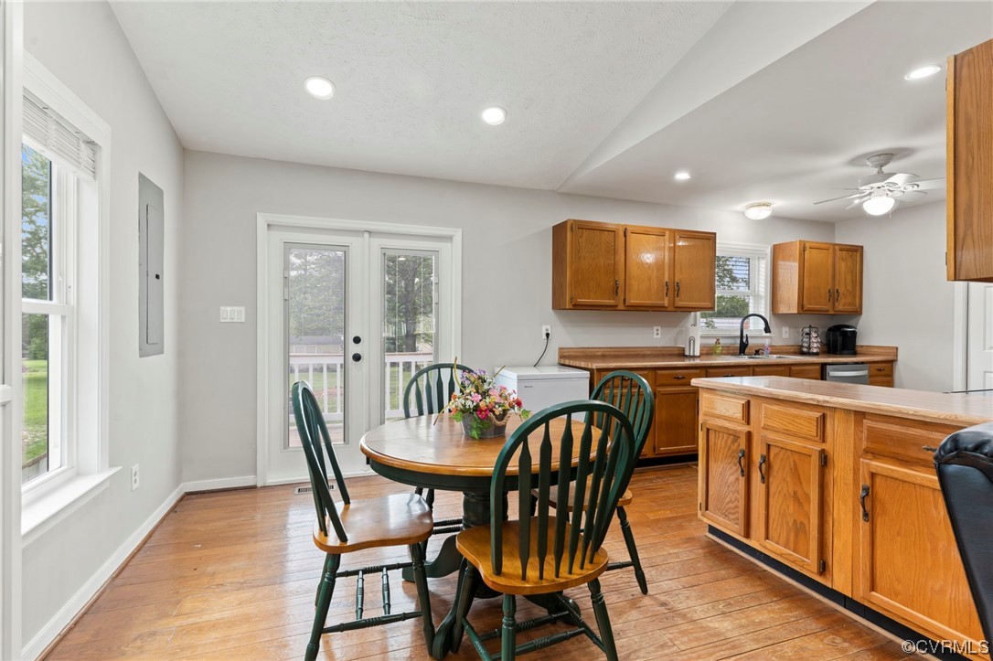 3315 Three Chopt Road Gum Spring, VA 23065 - Photo 8 of 27 a view of a dining room with furniture and wooden floor