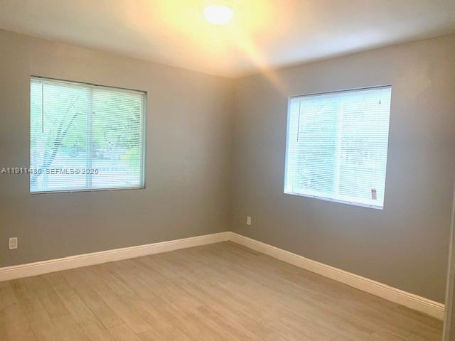 4126 Northwest 3rd Avenue, Unit 4126 Miami, FL 33127 - Photo 14 of 29 an empty room with a window