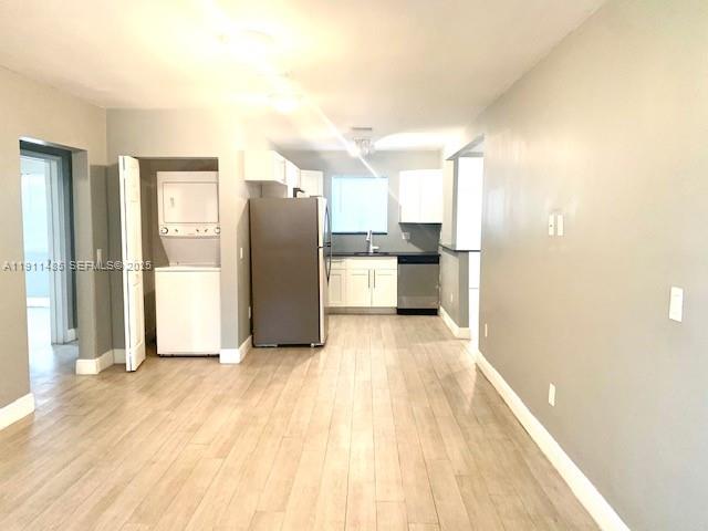 4126 Northwest 3rd Avenue, Unit 4126 Miami, FL 33127 - Photo 3 of 29 a view of a kitchen with a stove top oven