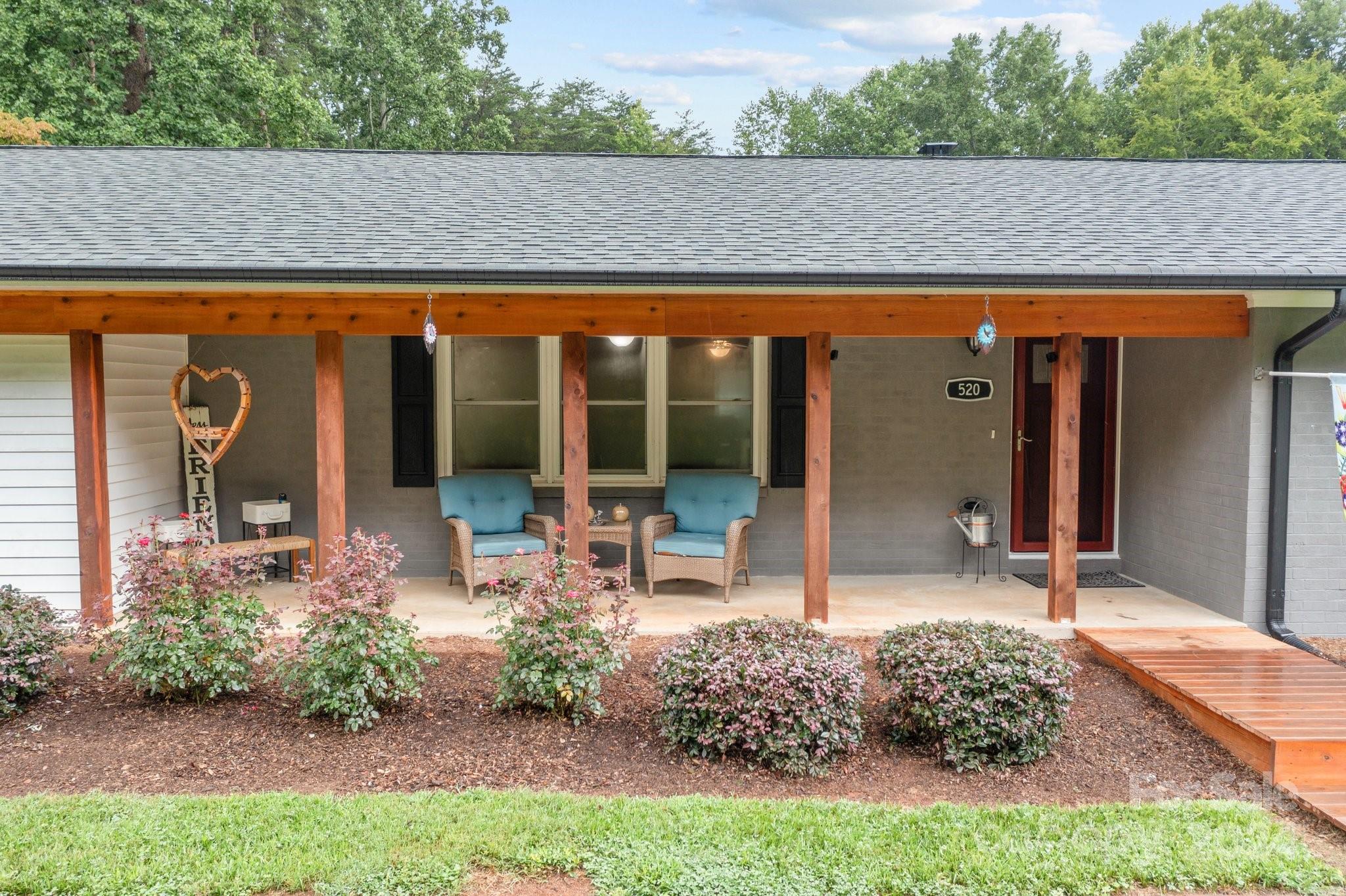 520 Cromer Road Salisbury, NC 28146 - Photo 2 of 48 a backyard of a house with table and chairs