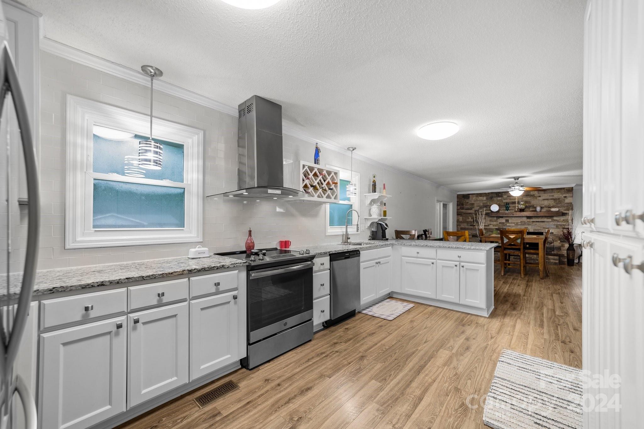 520 Cromer Road Salisbury, NC 28146 - Photo 21 of 48 a kitchen with white cabinets and sink