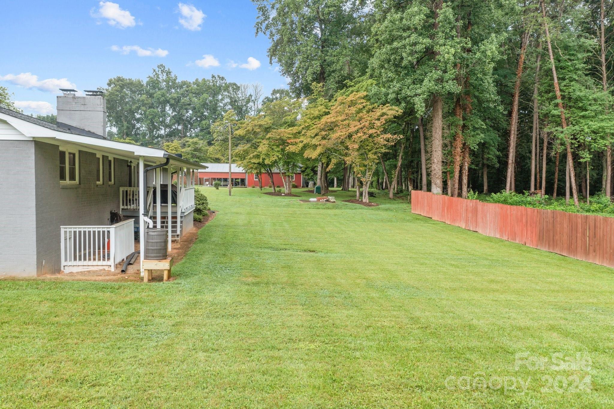 520 Cromer Road Salisbury, NC 28146 - Photo 35 of 48 a view of a house with a yard and sitting area