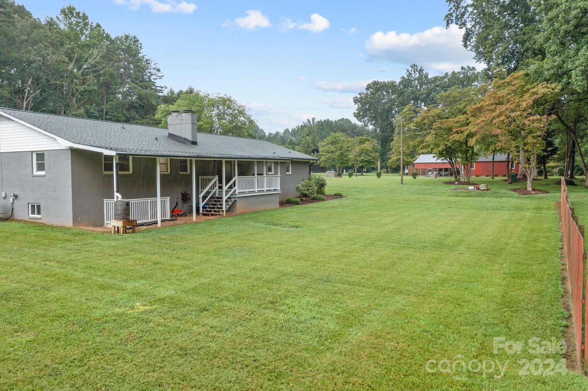 520 Cromer Road Salisbury, NC 28146 - Photo 36 of 48 a view of a house with backyard and a tree
