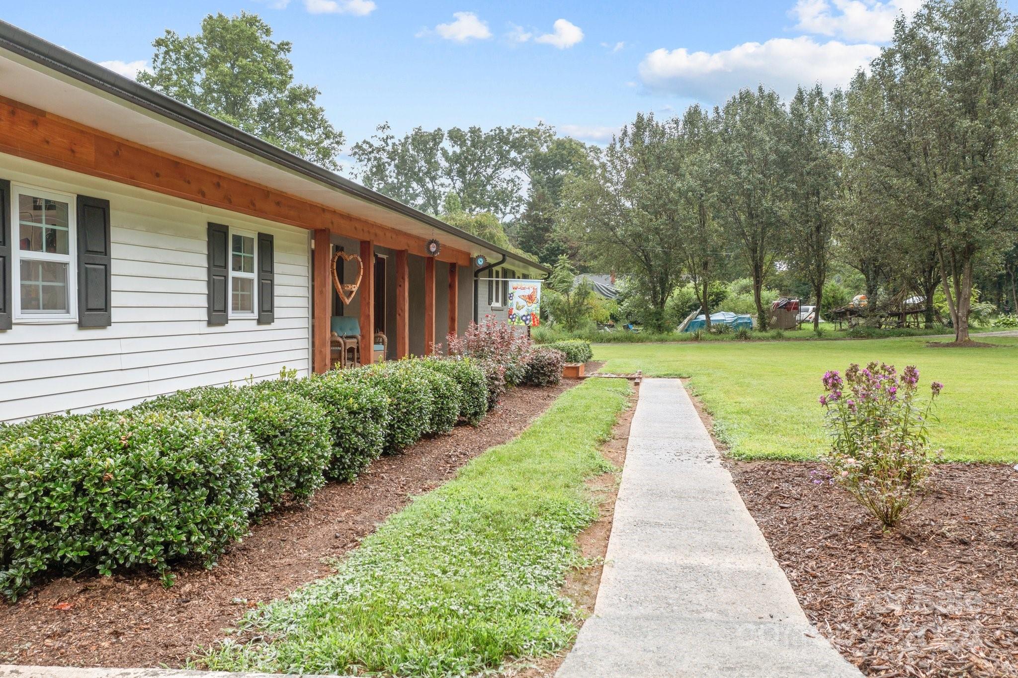 520 Cromer Road Salisbury, NC 28146 - Photo 7 of 48 a view of a house with garden