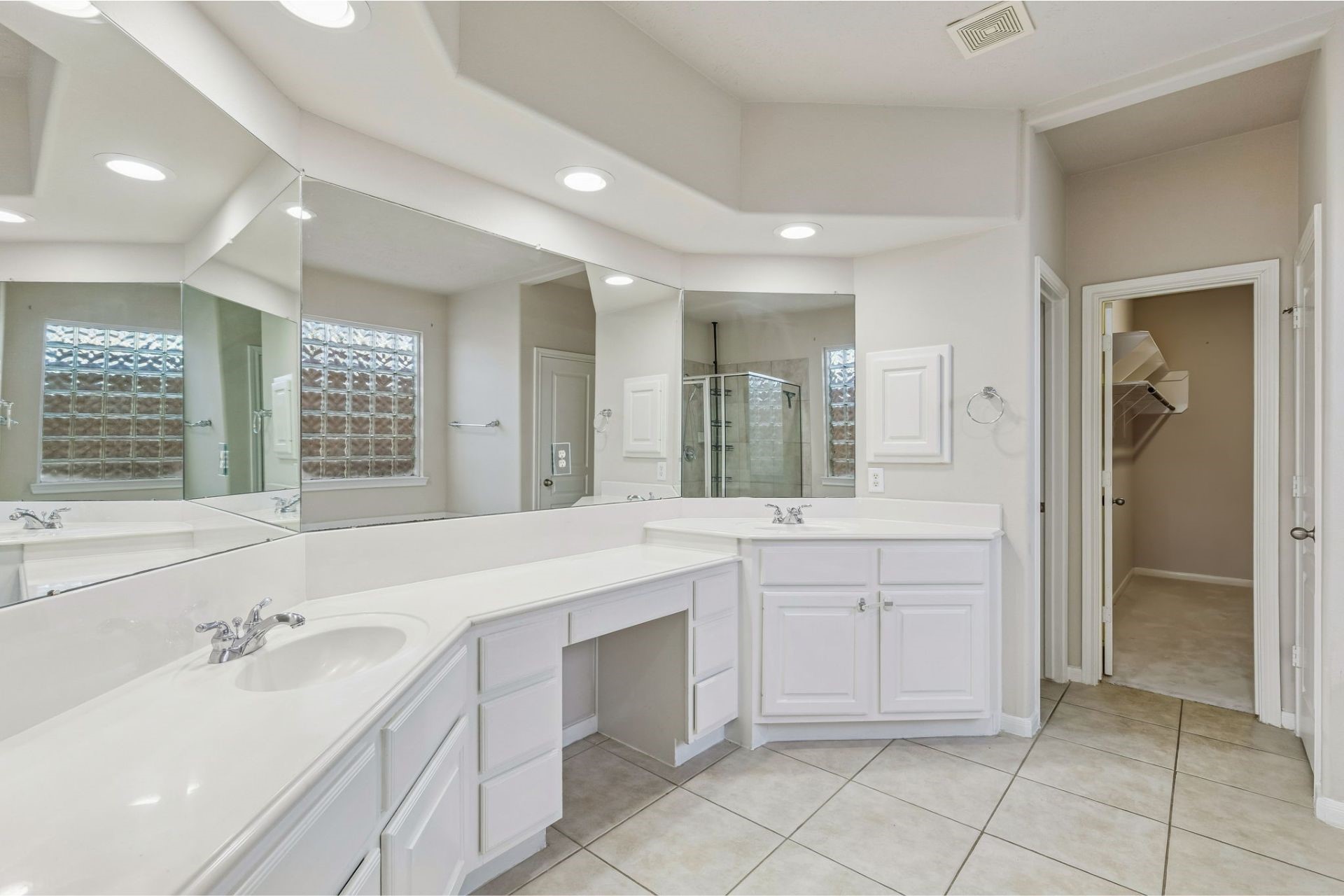 6518 Montana Ridge Court Houston, TX 77041 - Photo 10 of 22 Primary bathroom featuring dual sinks, generous vanity space, a separate tub, and shower.
