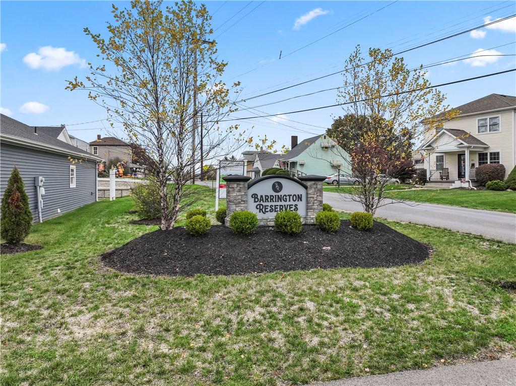 16 Barrington Court Monaca, PA 15061 - Photo 2 of 36 a front view of a house with a yard and garage