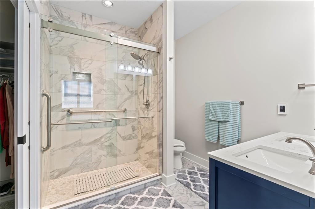 16 Barrington Court Monaca, PA 15061 - Photo 21 of 36 a bathroom with a sink and a mirror