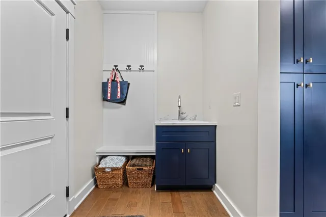 a bathroom with a sink and mirror