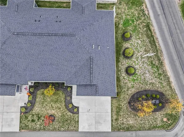 an aerial view of a house with a garden