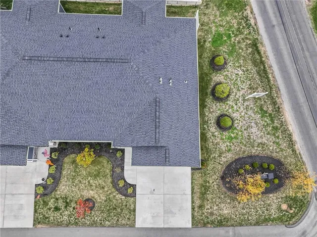 an aerial view of a house with a garden