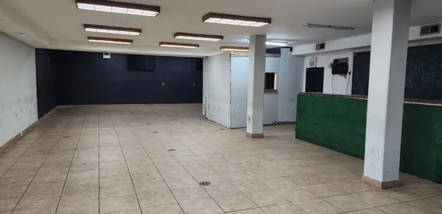 a view of kitchen and empty racks