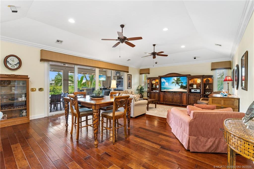 3192 Southeast Fairway West Stuart, FL 34997 - Photo 21 of 76 a view of a dining room with furniture window and wooden floor