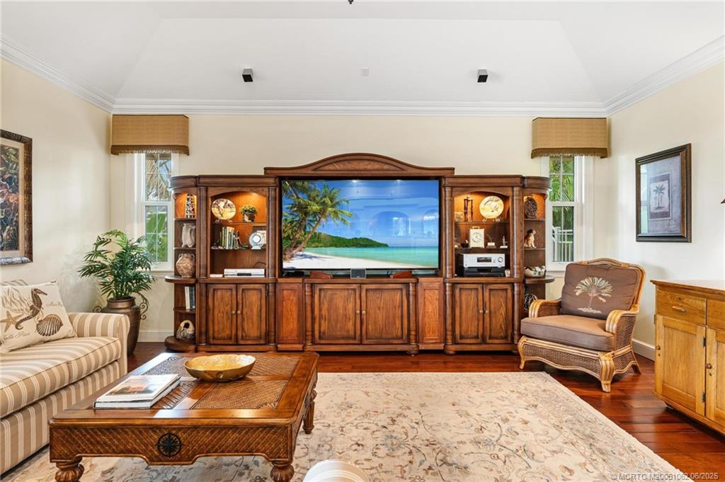 3192 Southeast Fairway West Stuart, FL 34997 - Photo 26 of 76 a living room with furniture a rug and a large window