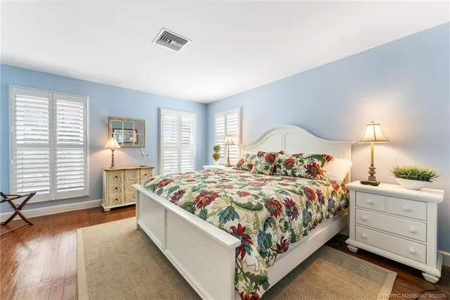 a kitchen with a refrigerator and a stove