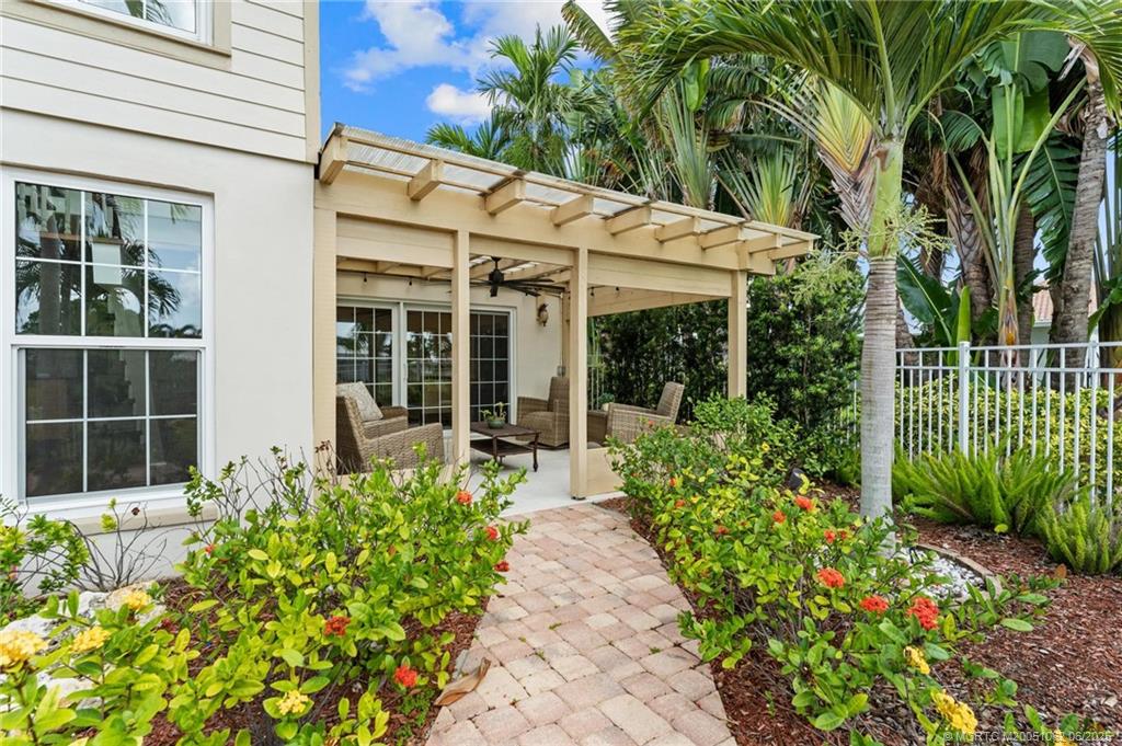 3192 Southeast Fairway West Stuart, FL 34997 - Photo 51 of 76 Rear Patio/ Pergola Off Family Room