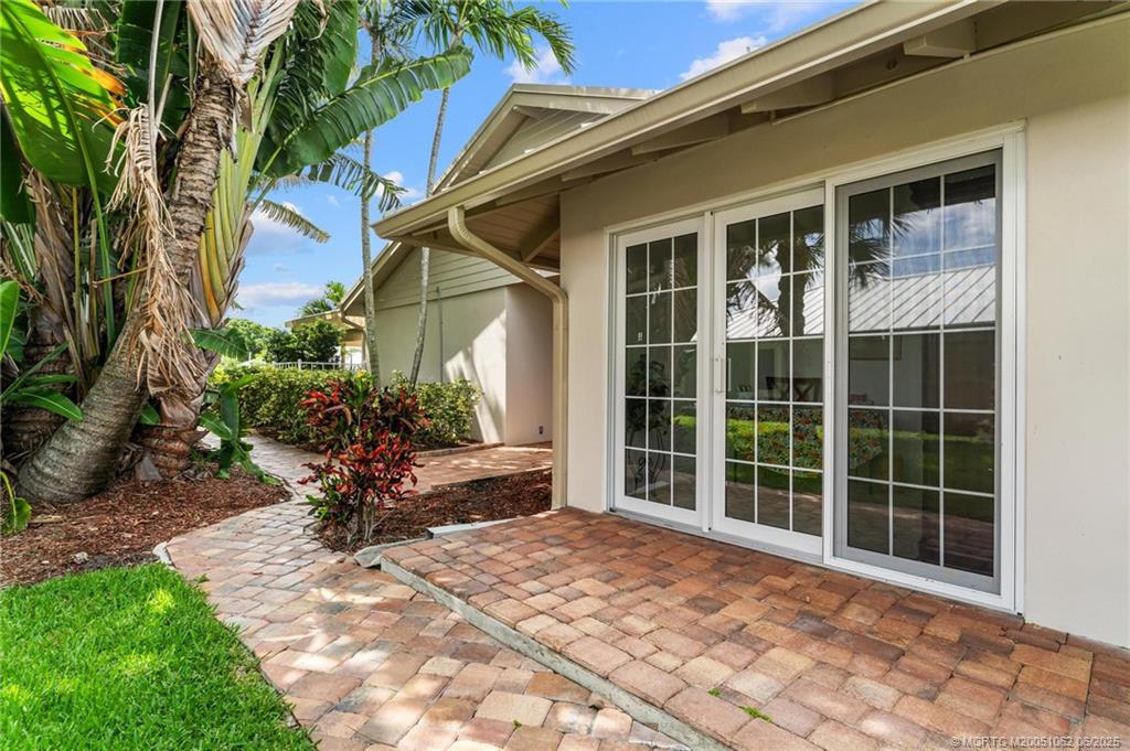 3192 Southeast Fairway West Stuart, FL 34997 - Photo 68 of 76 a view of house with backyard space and garden