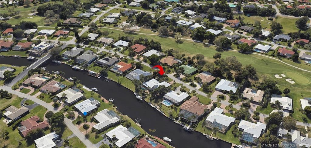 3192 Southeast Fairway West Stuart, FL 34997 - Photo 70 of 76 an aerial view of a city