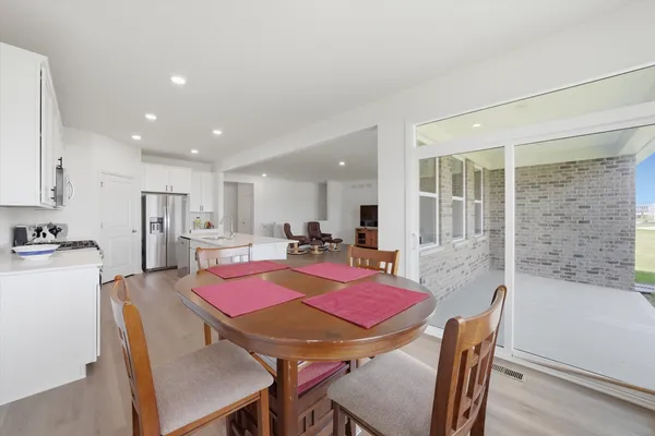 a view of a dining room with furniture