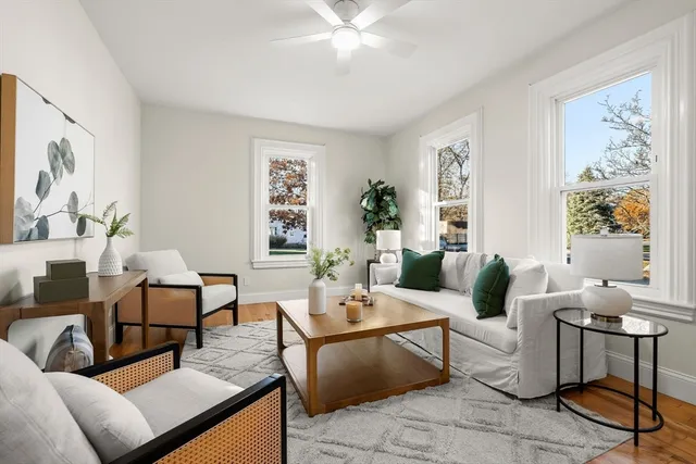 a living room with furniture and window