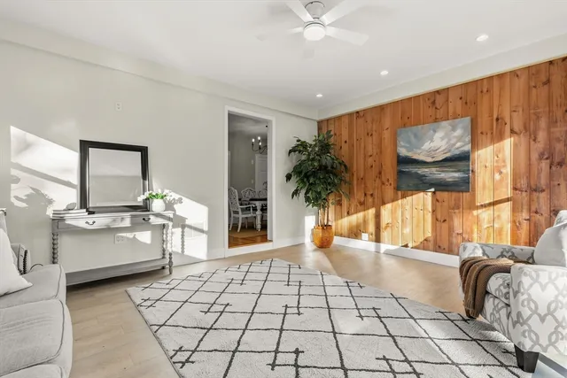 a lobby with furniture and window