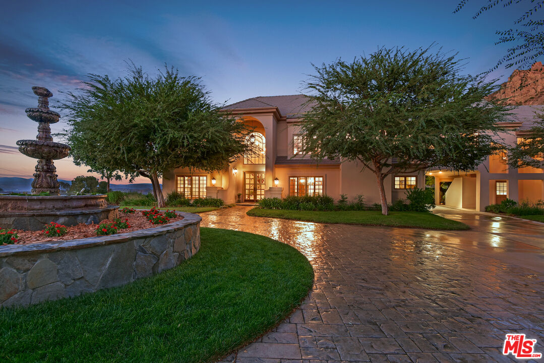 480 Westlake Boulevard Malibu, CA 90265 - Photo 1 of 36 a view of a house with a yard and tree s