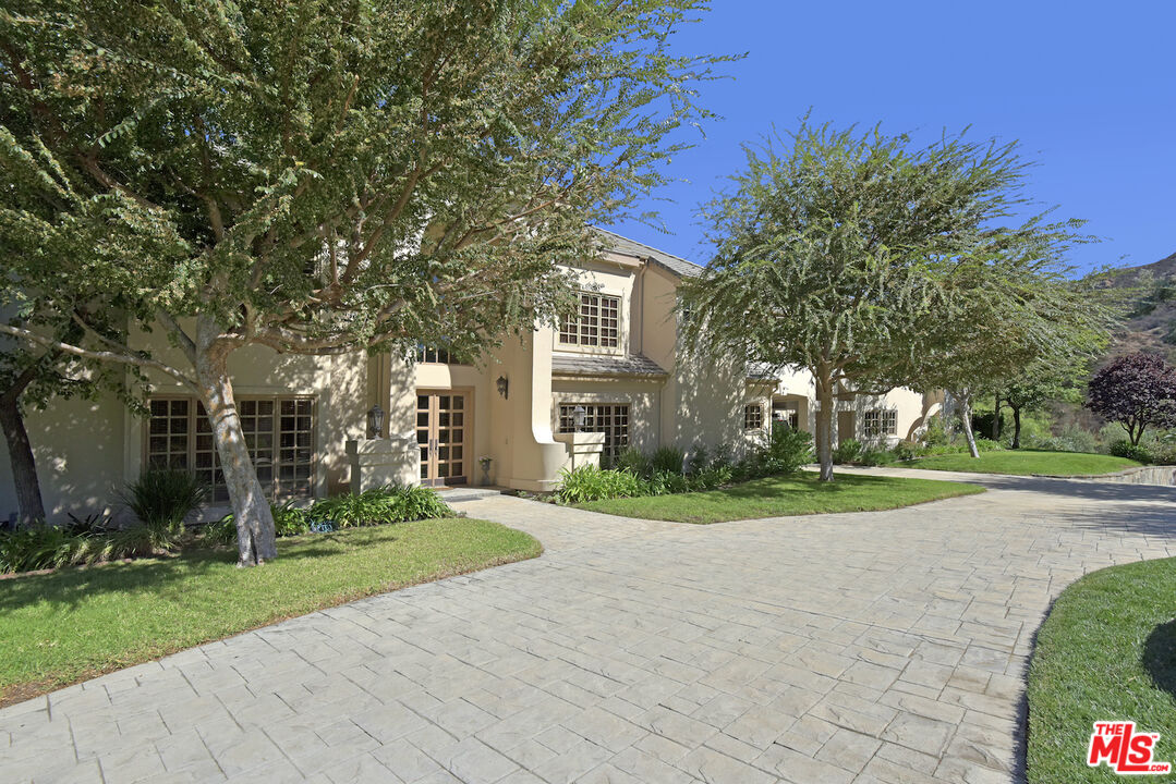 480 Westlake Boulevard Malibu, CA 90265 - Photo 2 of 36 a view of a house with a yard