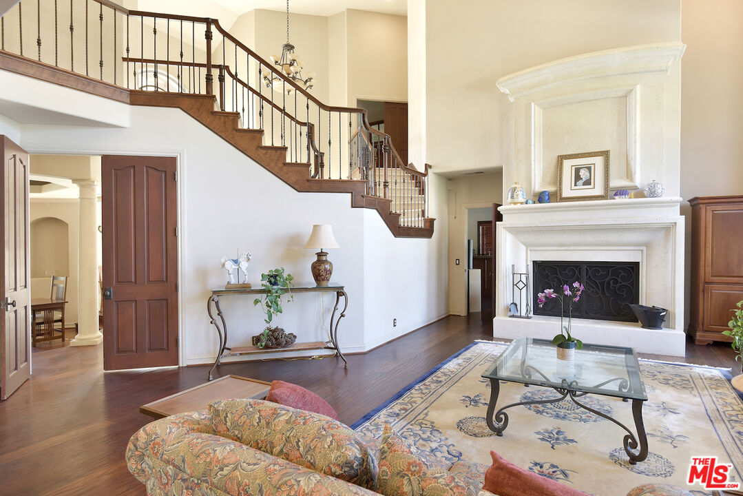 480 Westlake Boulevard Malibu, CA 90265 - Photo 11 of 36 a living room with furniture and a fireplace