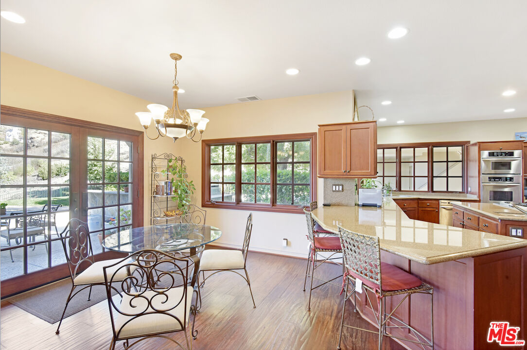 480 Westlake Boulevard Malibu, CA 90265 - Photo 15 of 36 a very nice looking dining room with a large window and furniture
