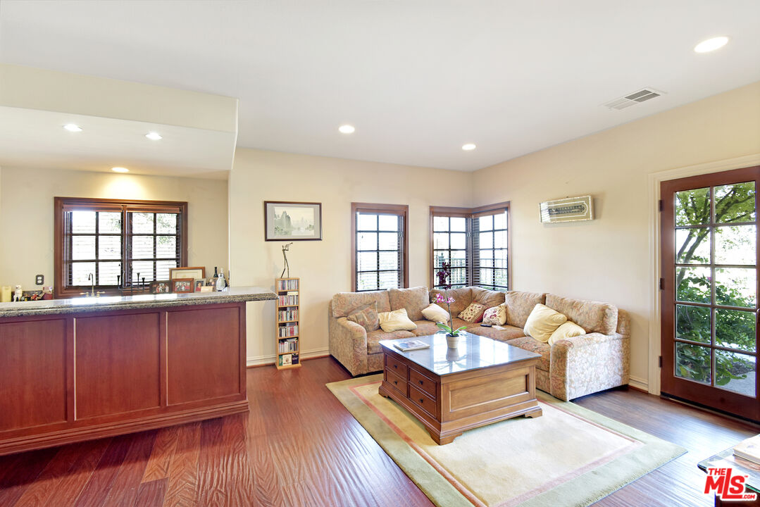 480 Westlake Boulevard Malibu, CA 90265 - Photo 25 of 36 a living room with furniture and wooden floor