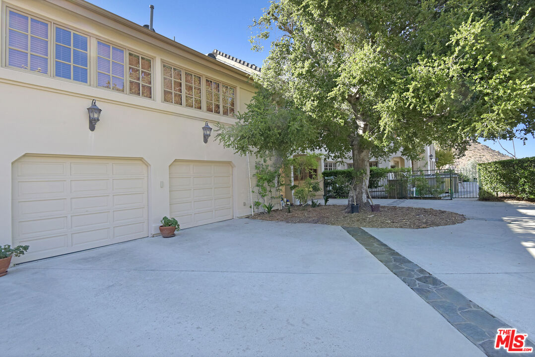 480 Westlake Boulevard Malibu, CA 90265 - Photo 27 of 36 front view of a house with a street