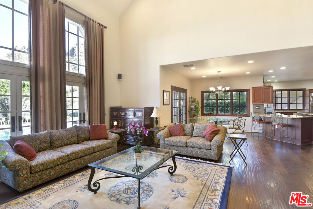 480 Westlake Boulevard Malibu, CA 90265 - Photo 9 of 36 a living room with furniture and a large window