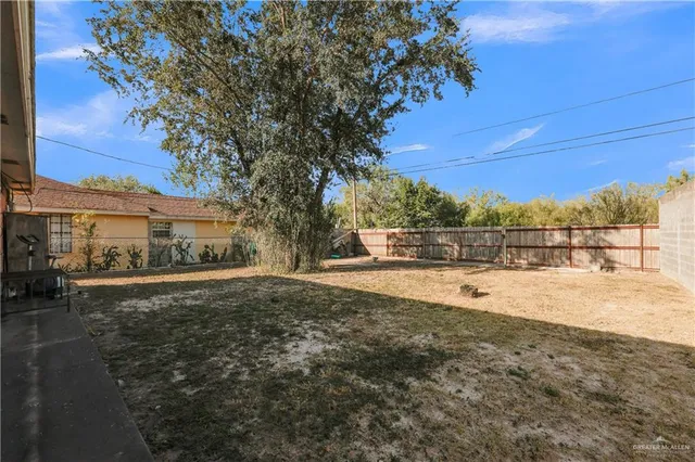 a view of outdoor space with deck and tree