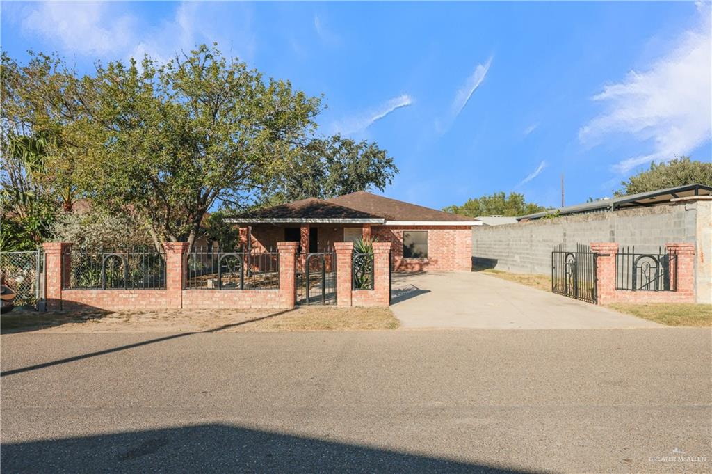 537 Benito Street Rio Grande City, TX 78582 - Photo 3 of 20 a house with trees in the background